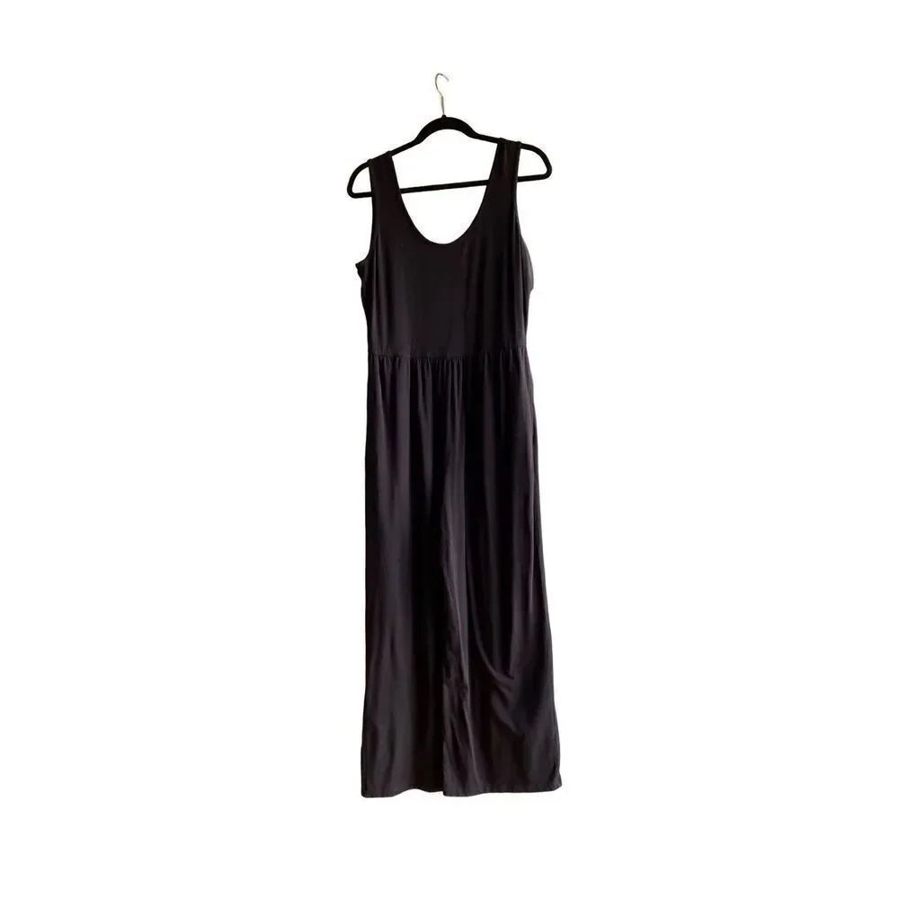Any body women’s black one piece wide leg jumpsuit size medium ￼